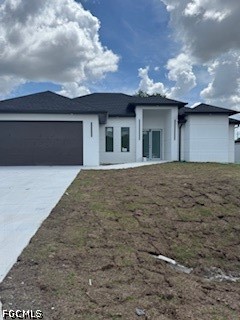 3603 4th Street West Lehigh Acres, FL 33971 - Photo 1 of 28 a front view of a house with a yard