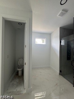 3603 4th Street West Lehigh Acres, FL 33971 - Photo 18 of 28 a bathroom with a granite countertop toilet and a shower