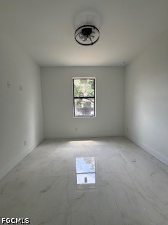 3603 4th Street West Lehigh Acres, FL 33971 - Photo 19 of 28 an empty room with a window