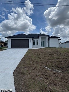 3603 4th Street West Lehigh Acres, FL 33971 - Photo 2 of 28 a front view of house with yard