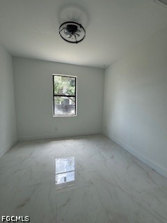 3603 4th Street West Lehigh Acres, FL 33971 - Photo 22 of 28 an empty room with a window