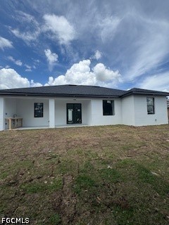 3603 4th Street West Lehigh Acres, FL 33971 - Photo 26 of 28 a front view of house with yard