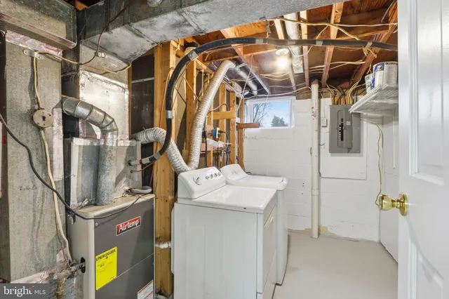 a utility room with dryer and washer