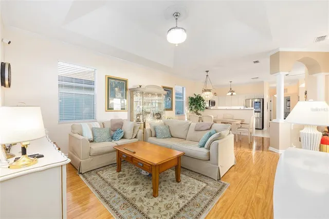 a en suite bathroom with a tub sink and a mirror