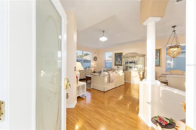 a living room with dining table and a couch