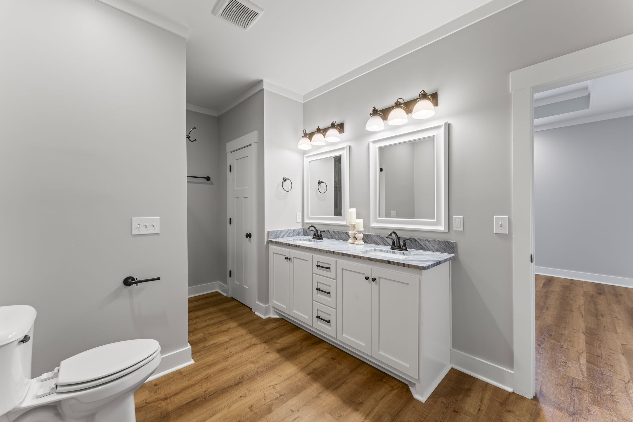 5706 Lunns Store Road Chapel Hill, TN 37034 - Photo 17 of 37 a bathroom with a granite countertop sink toilet a large mirror a shower and a bathtub