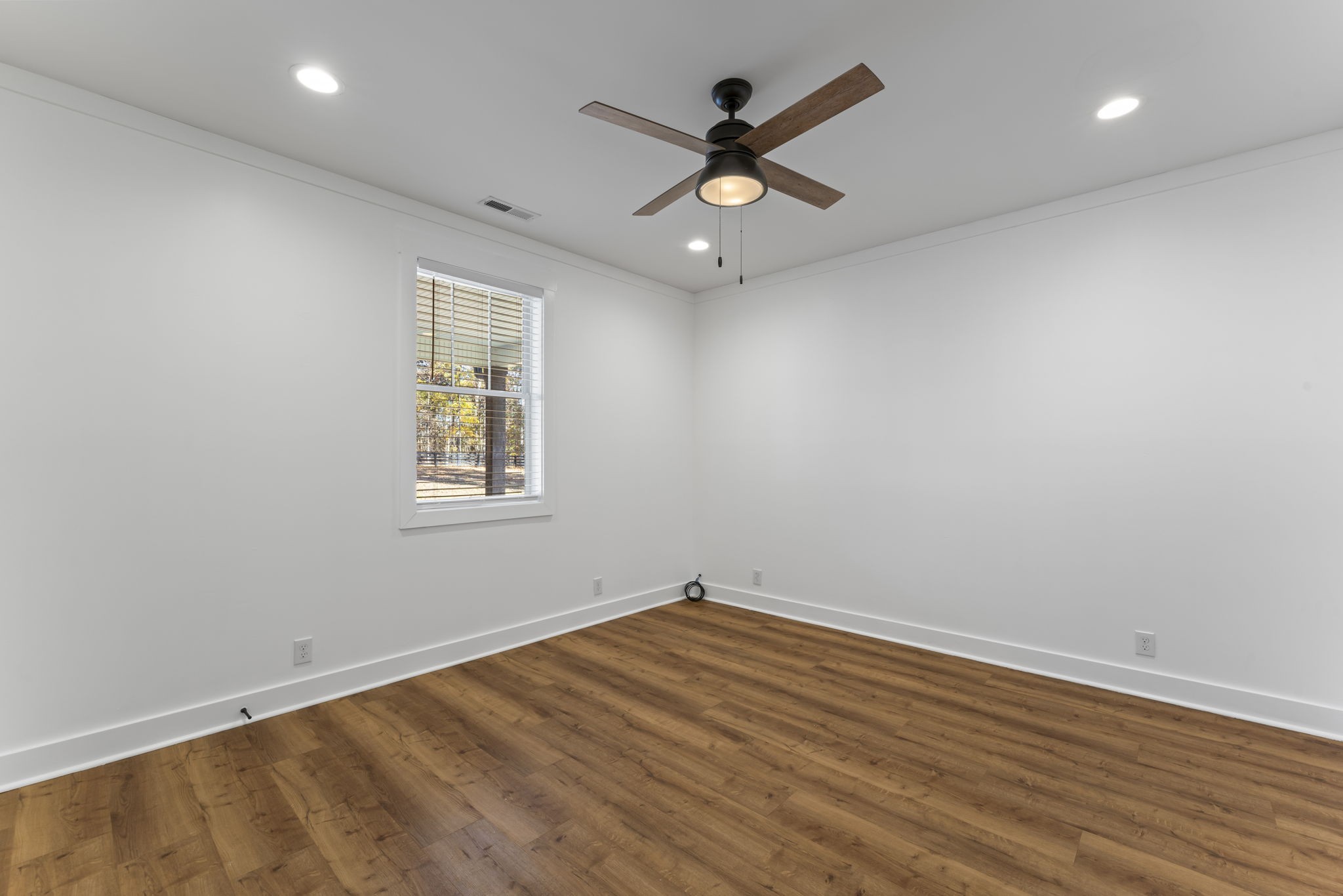 5706 Lunns Store Road Chapel Hill, TN 37034 - Photo 24 of 37 an empty room with a window and ceiling fan