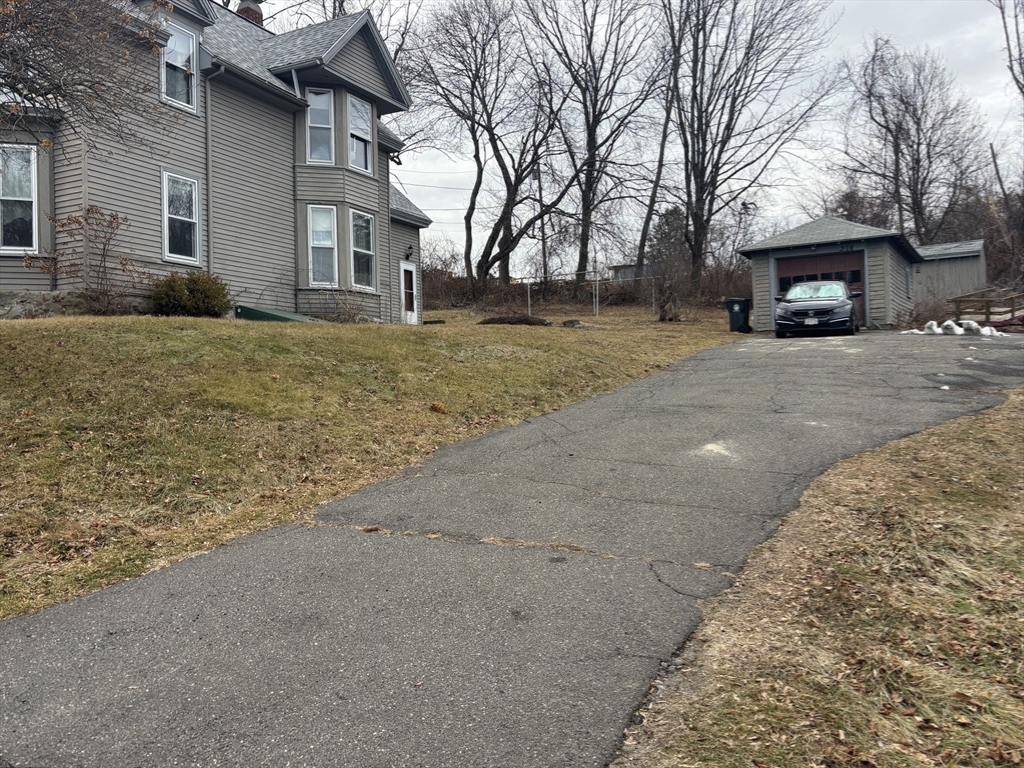 316 Amesbury Road Haverhill, MA 01830 - Photo 23 of 28 a view of house with truck parked in front of house