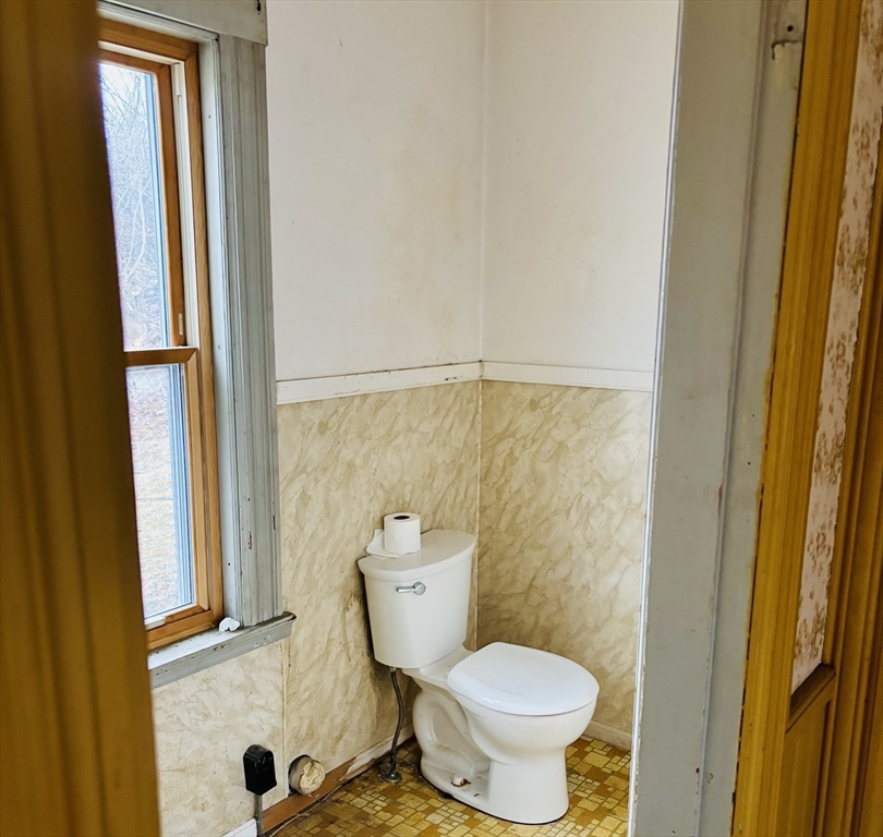 316 Amesbury Road Haverhill, MA 01830 - Photo 7 of 28 a bathroom with a toilet and a shower