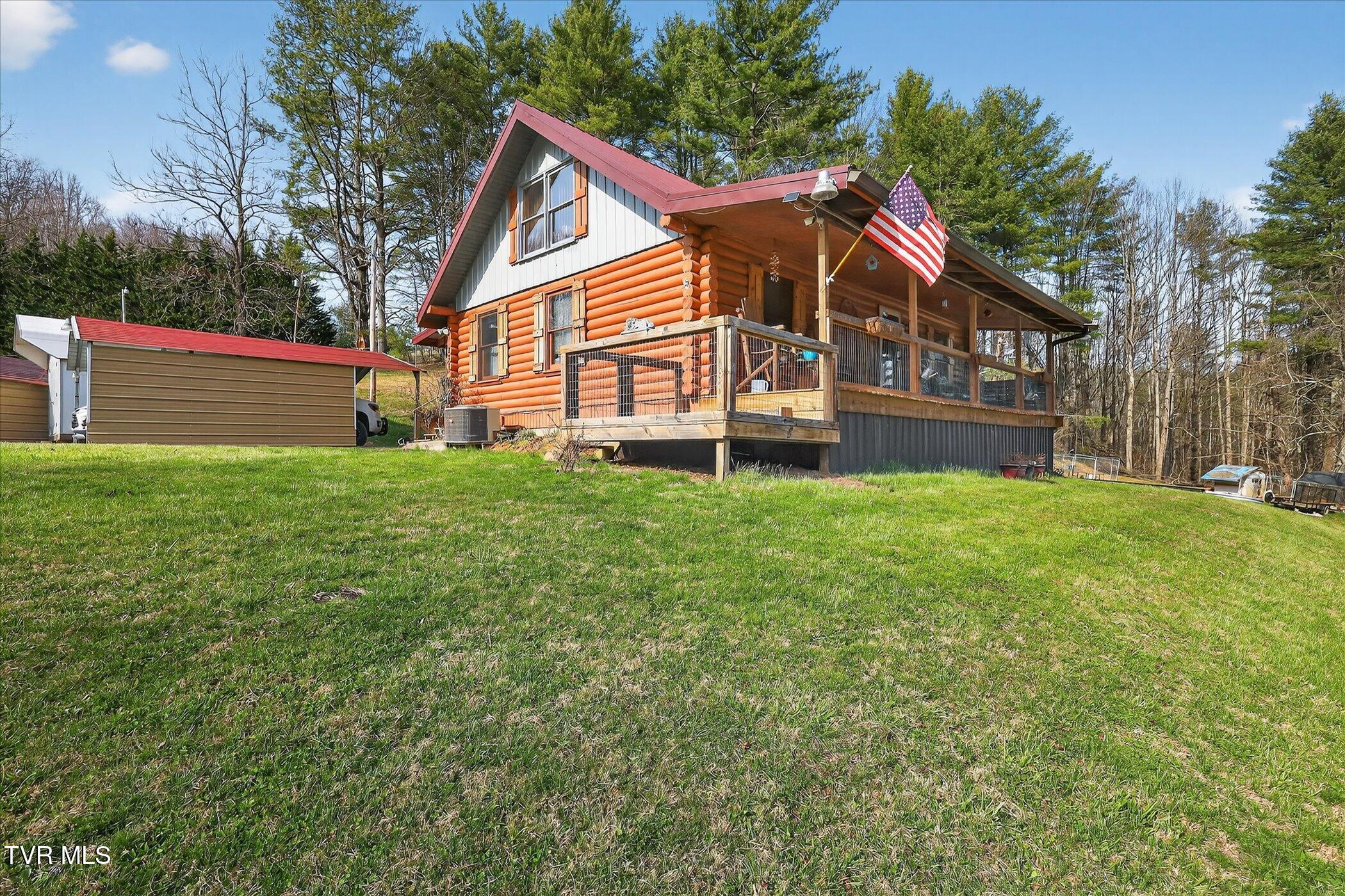 250 Beaver Walk Road Mountain City, TN 37683 - Photo 29 of 34 03-250-Beaver-Walk-Rd-Exterior from Lft