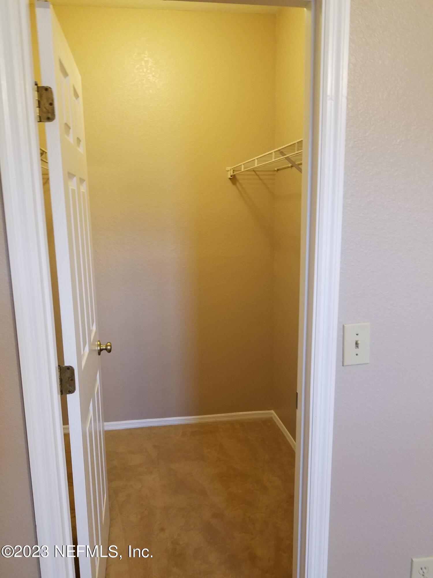 13810 Sutton Park Drive North, Unit 124 Jacksonville, FL 32224 - Photo 11 of 12 a bathroom with a shower