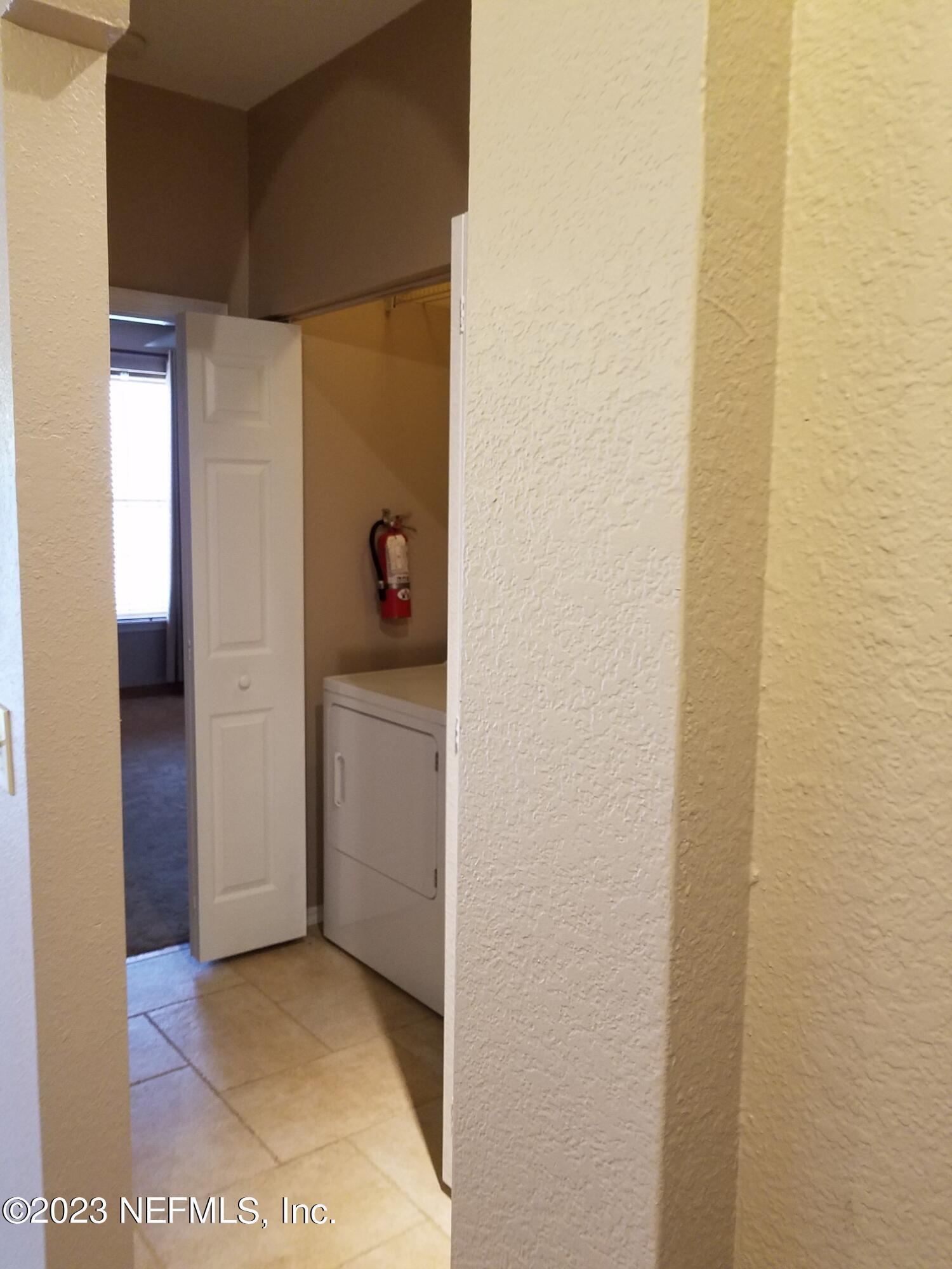 13810 Sutton Park Drive North, Unit 124 Jacksonville, FL 32224 - Photo 9 of 12 a view of a closet area