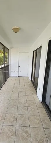 a view of a room with a washer and dryer