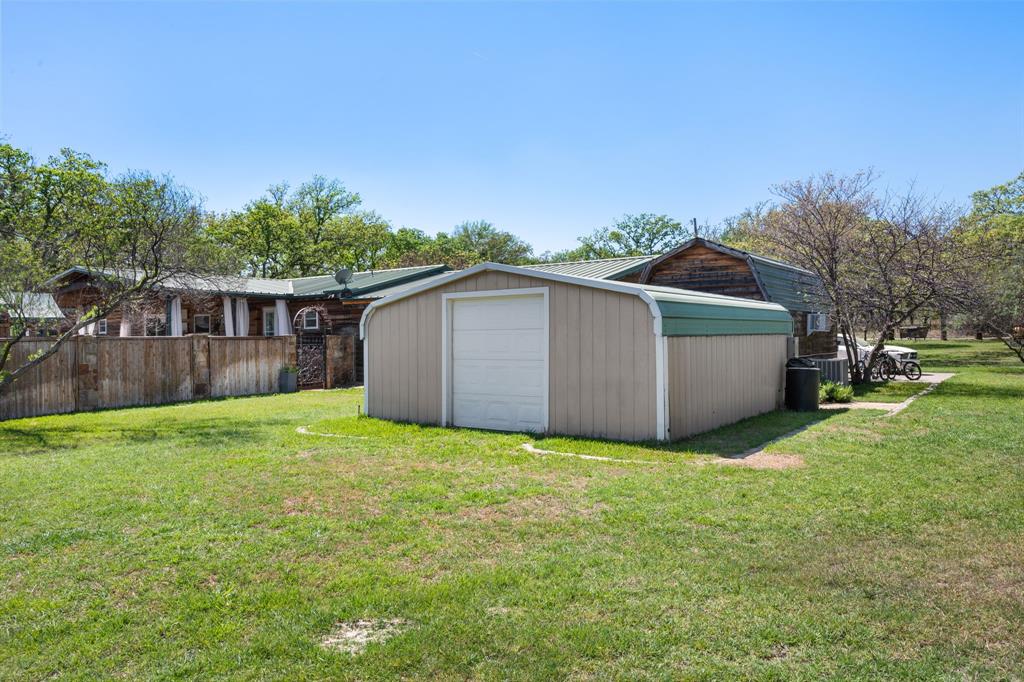 660 Deer Trail Gordon, TX 76453 - Photo 38 of 40 a view of a backyard with a house