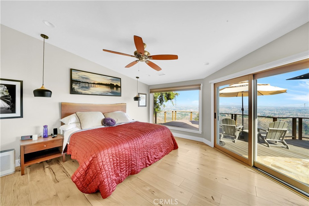 3064 Nestall Road Laguna Beach, CA 92651 - Photo 14 of 29 a bedroom with a large bed and a large window