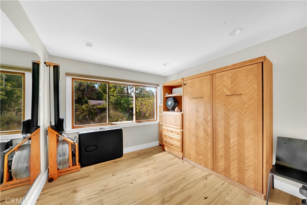 3064 Nestall Road Laguna Beach, CA 92651 - Photo 21 of 29 a room with a bed and a large window