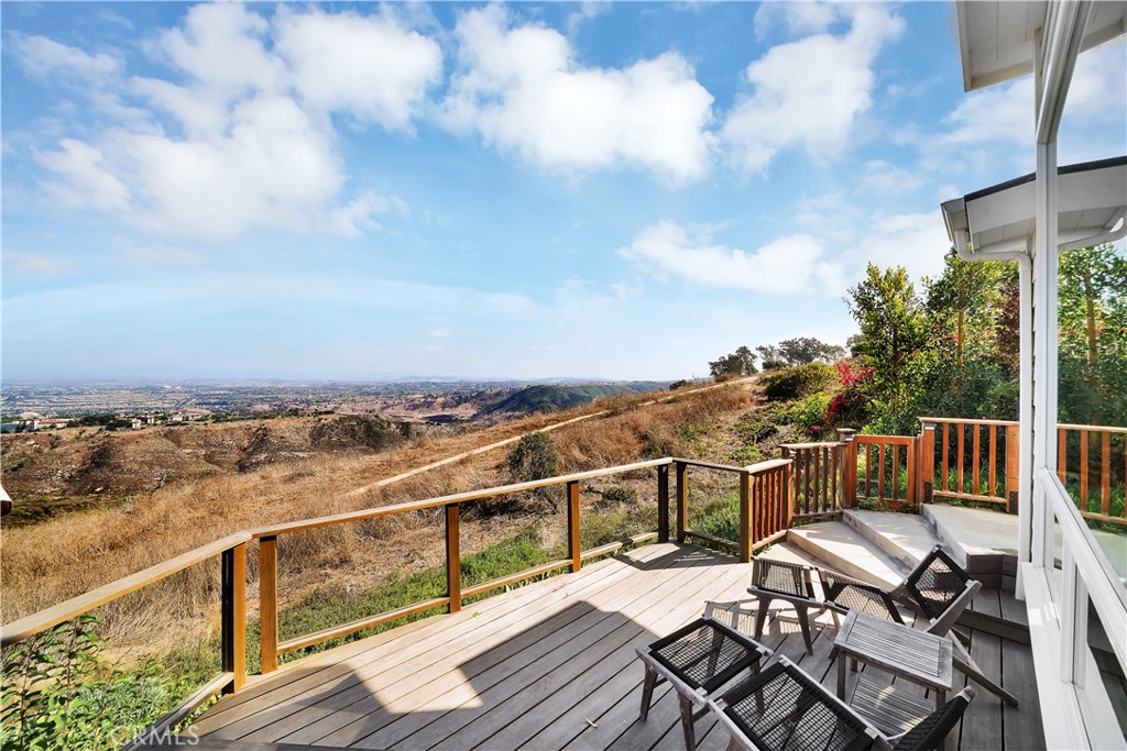 3064 Nestall Road Laguna Beach, CA 92651 - Photo 27 of 29 a view of a terrace with wooden benches
