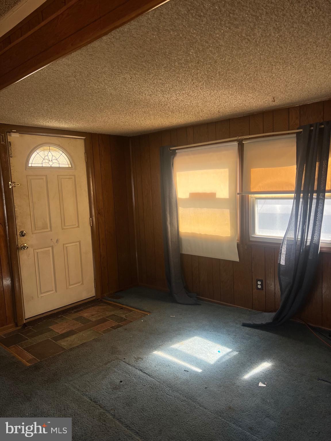 1302 Gibson Road, Unit 152 Bensalem, PA 19020 - Photo 2 of 17 an empty room with windows