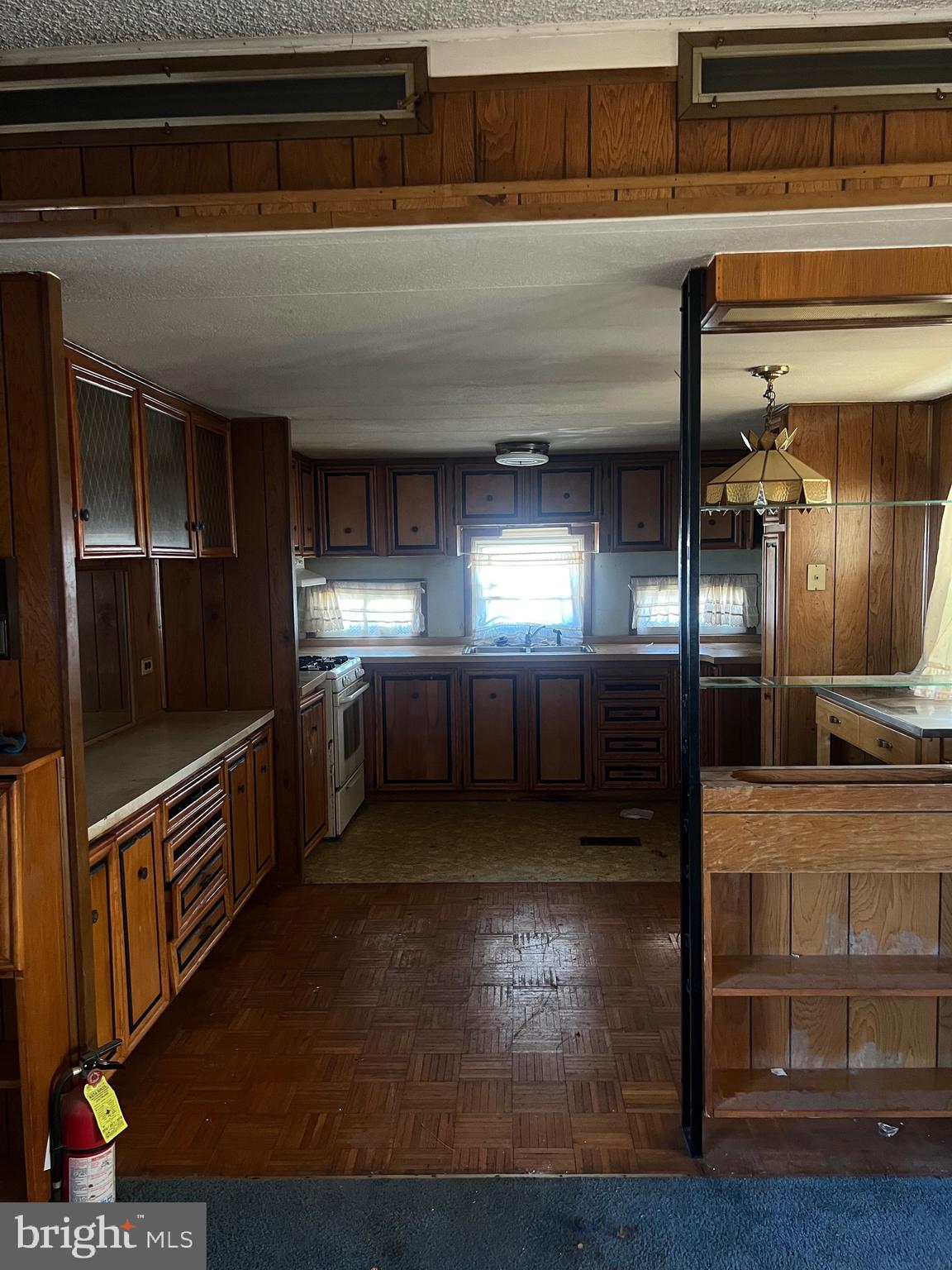 1302 Gibson Road, Unit 152 Bensalem, PA 19020 - Photo 5 of 17 a kitchen with granite countertop lots of counter top space