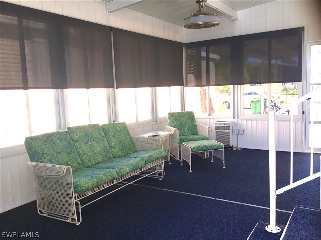 15550 Burnt Store Road, Unit 13 Punta Gorda, FL 33955 - Photo 24 of 30 a living room with furniture and window