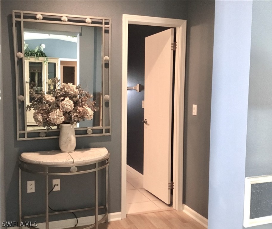 15550 Burnt Store Road, Unit 13 Punta Gorda, FL 33955 - Photo 8 of 30 a view of a bathroom with a glass door