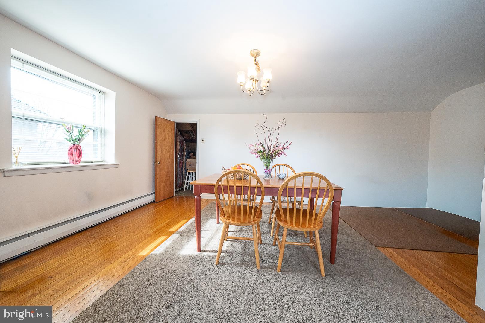 11 Tenby Road Havertown, PA 19083 - Photo 35 of 57 a view of a dining room with furniture window and wooden floor