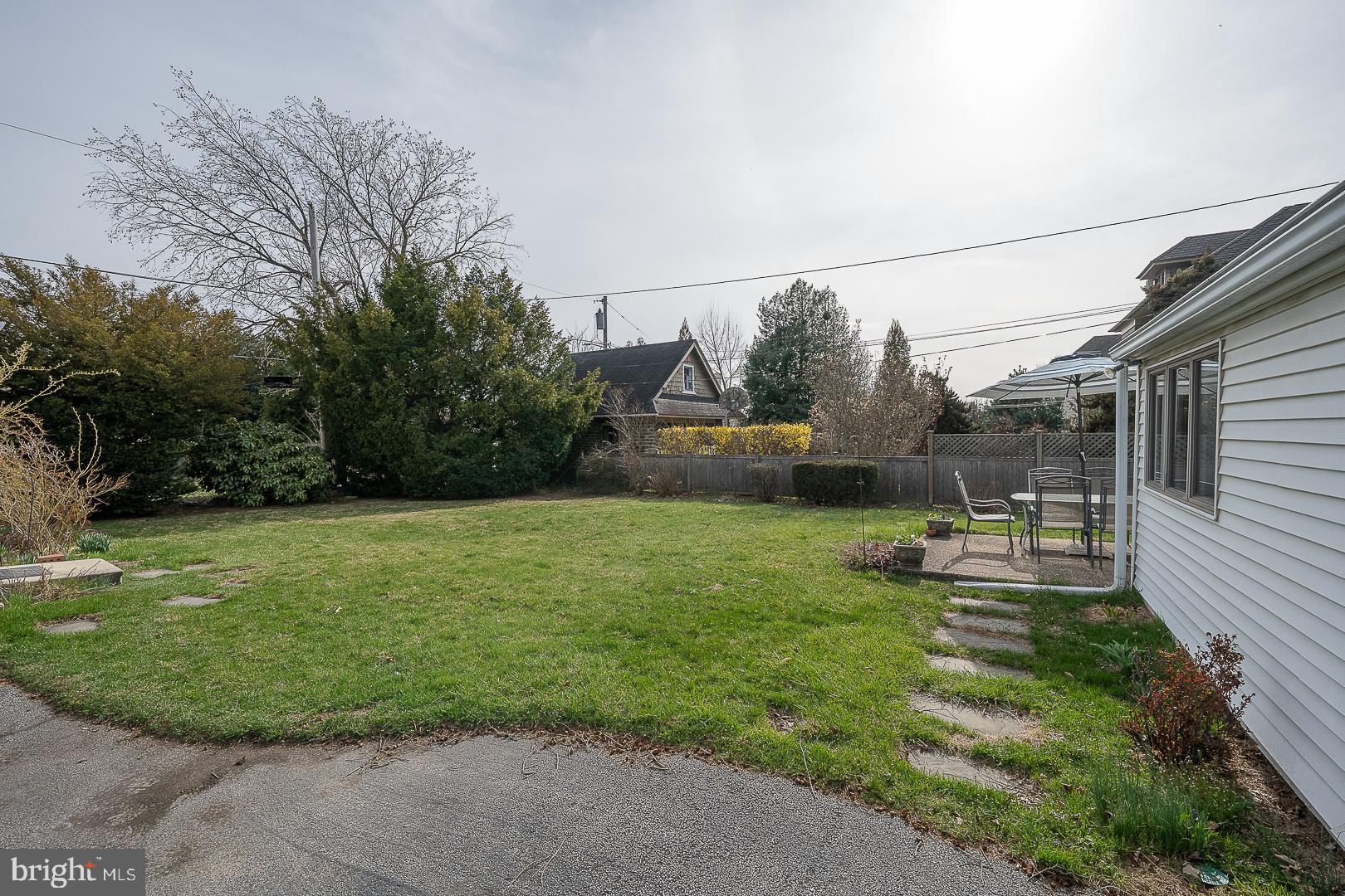 11 Tenby Road Havertown, PA 19083 - Photo 40 of 57 a view of a backyard with sitting area