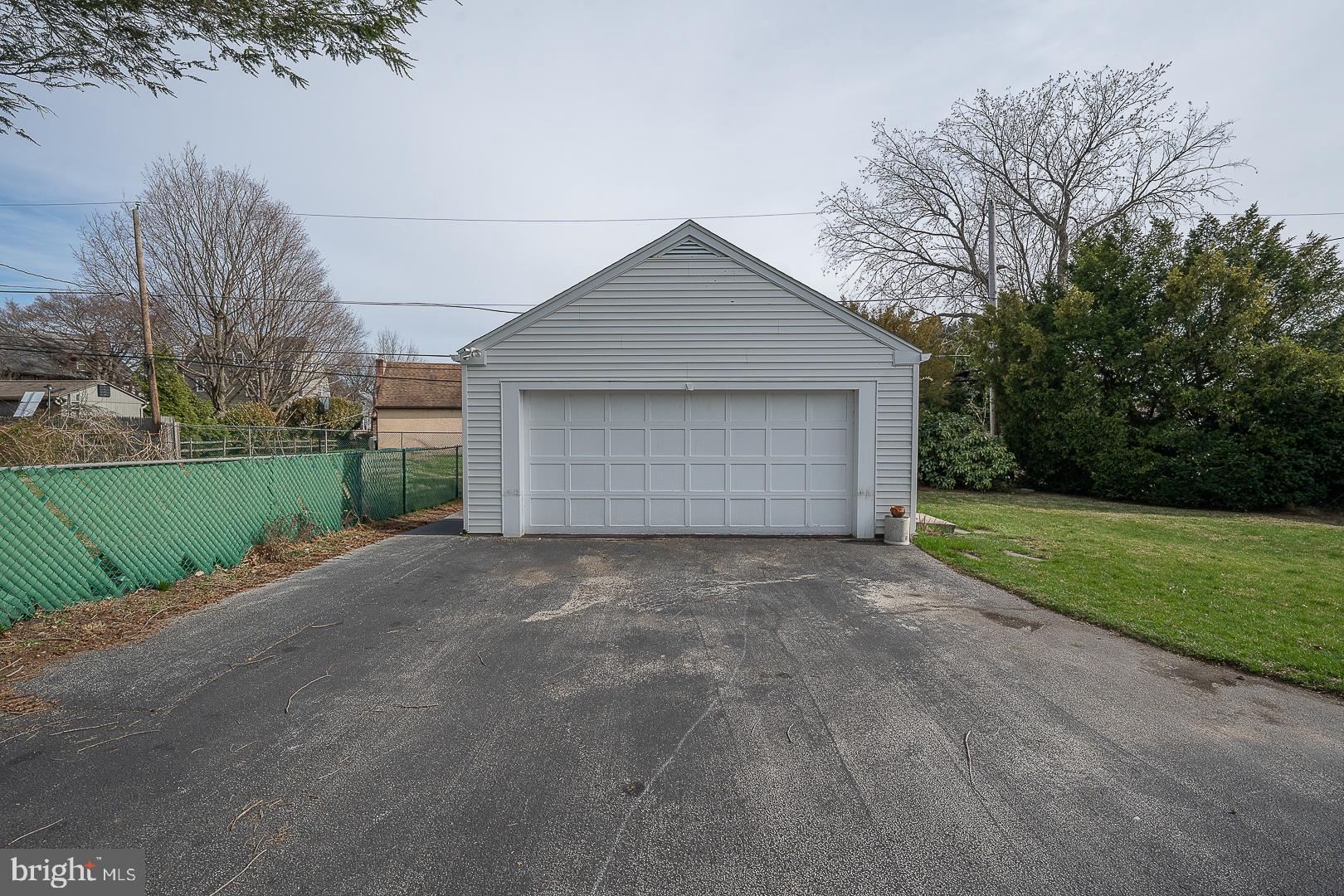 11 Tenby Road Havertown, PA 19083 - Photo 47 of 57 front view of a house with a yard and garage