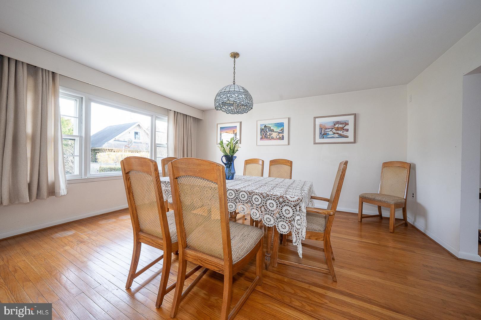 11 Tenby Road Havertown, PA 19083 - Photo 8 of 57 a view of a dining room with furniture window and wooden floor