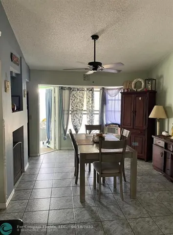 a bedroom with a bed and a lamp