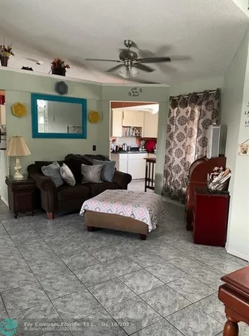 a bathroom with a toilet a sink and a mirror