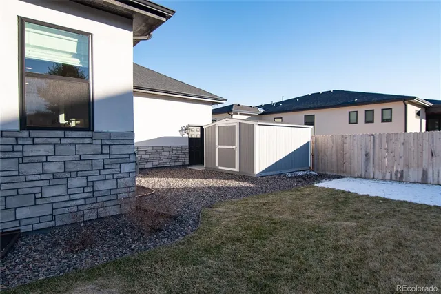 a view of a front of a house with a yard