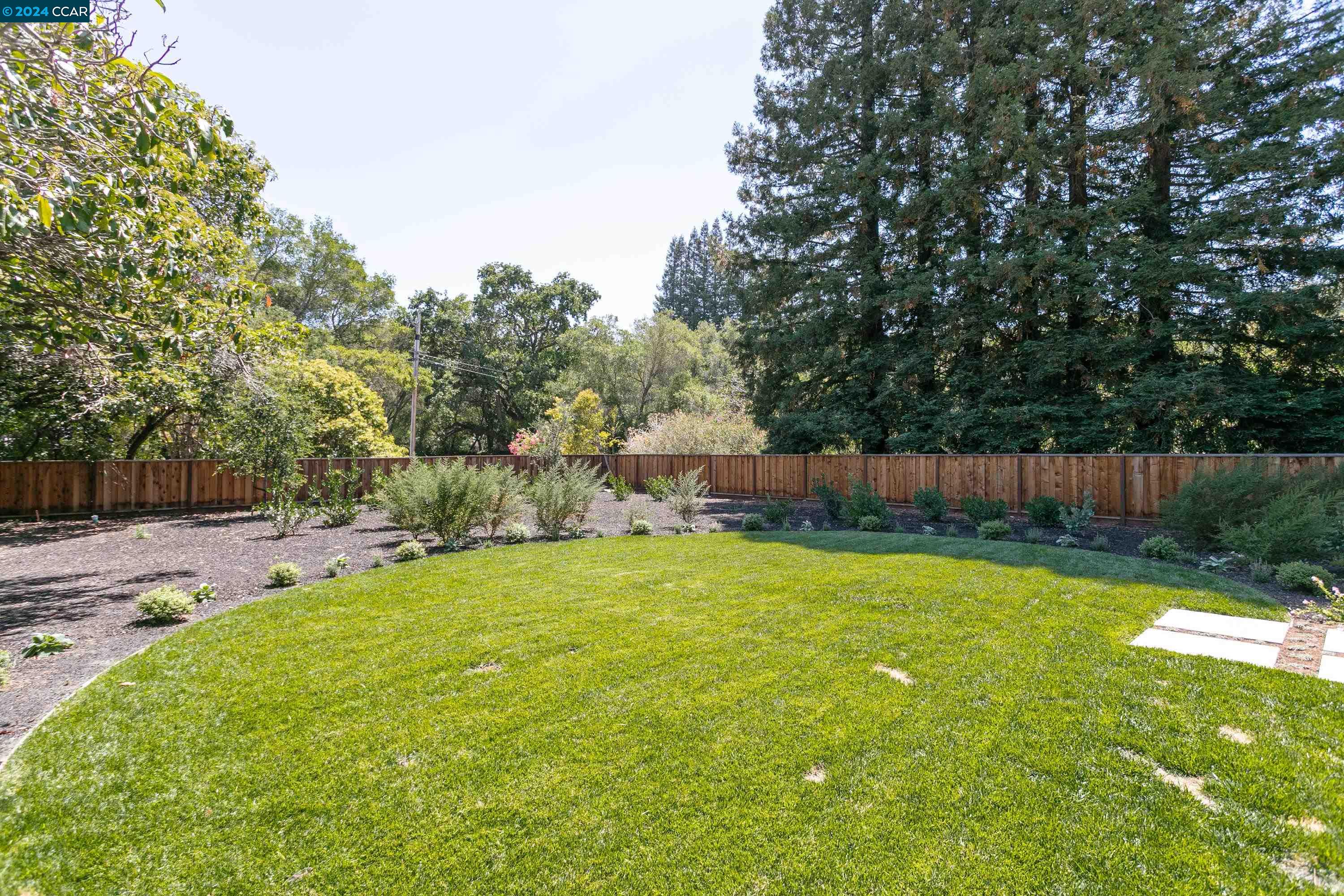 962 Reliez Station Lane Lafayette, CA 94549 - Photo 24 of 25 a swimming pool with wooden fence