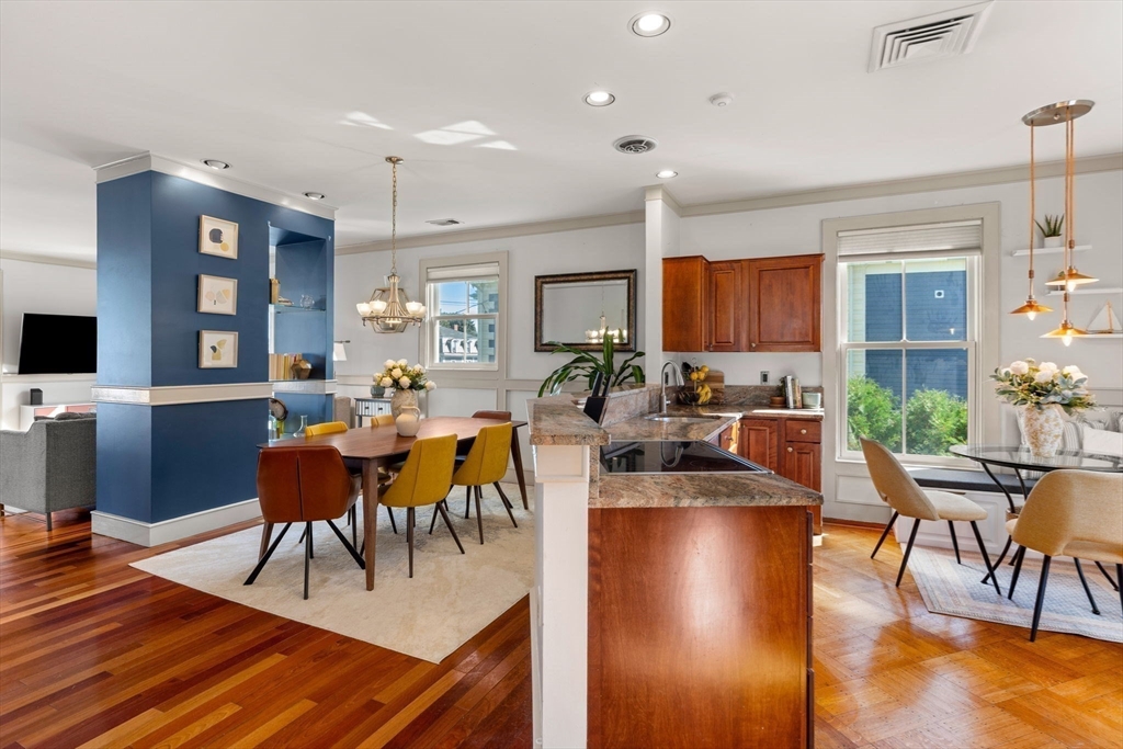 262 Lafayette Street, Unit 2 Salem, MA 01970 - Photo 11 of 41 a view of a dining room with furniture window and wooden floor