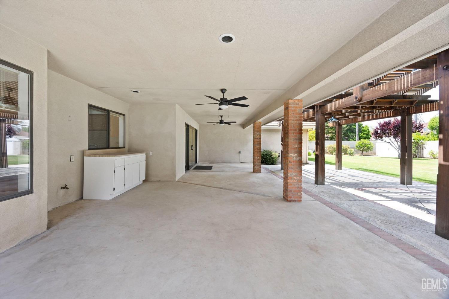 Undisclosed Address Bakersfield, CA 93309 - Photo 9 of 15 a view of a livingroom with a fireplace and window