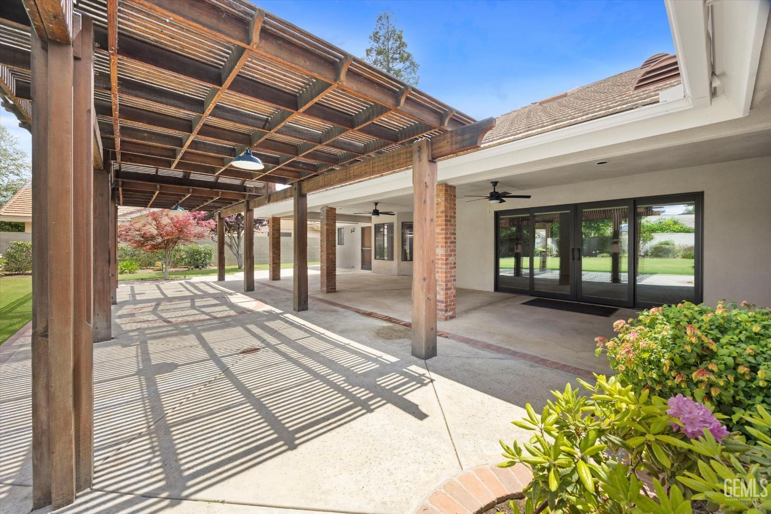 Undisclosed Address Bakersfield, CA 93309 - Photo 10 of 15 a view of a entryway door front of house