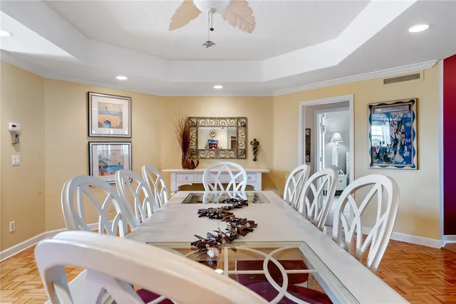 a view of a dining room with furniture