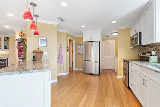 a kitchen with refrigerator and countertop