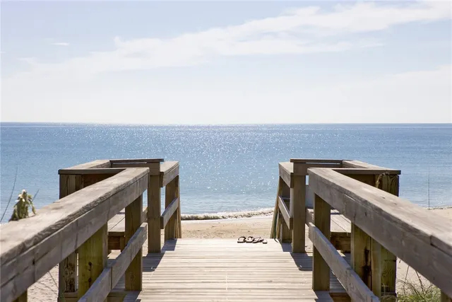 a balcony with view of wooden floor
