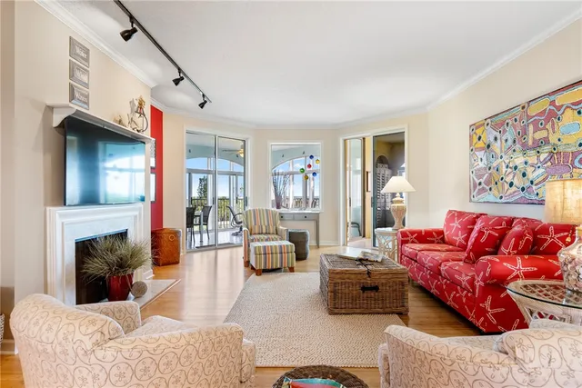 a living room with furniture or couch and a fireplace