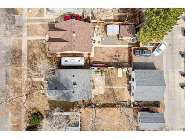 a view of a house with a yard and garage