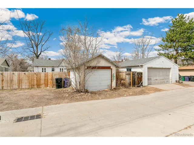 a front view of a house with a garage