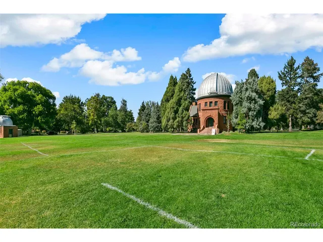 a front view of a building with outdoor space and balcony