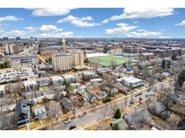 a view of city with ocean