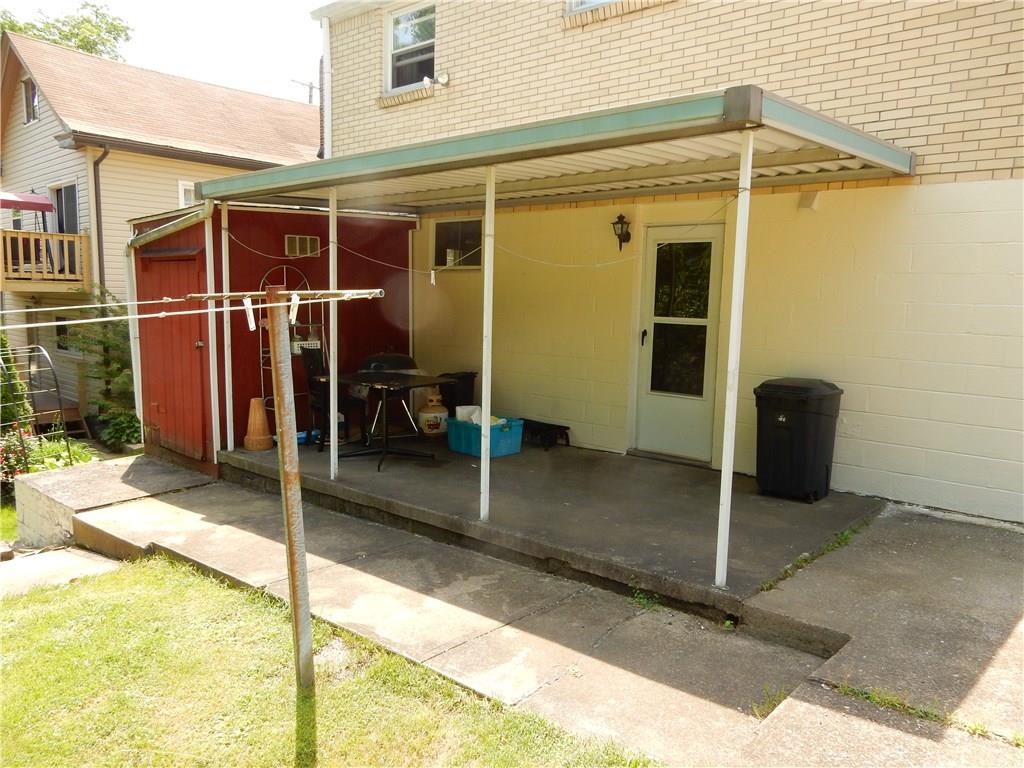 321 East Garden Road Pittsburgh, PA 15227 - Photo 5 of 20 Walk out from the laundry/utility area onto your back patio with storage in the shed