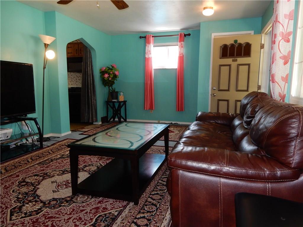 321 East Garden Road Pittsburgh, PA 15227 - Photo 7 of 20 Another view of the living room, with the front entrance off to the right, entrance to the eat in kitchen off to the left.