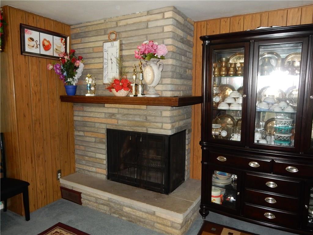 321 East Garden Road Pittsburgh, PA 15227 - Photo 8 of 20 The beautiful stone fire place, it is wood burning