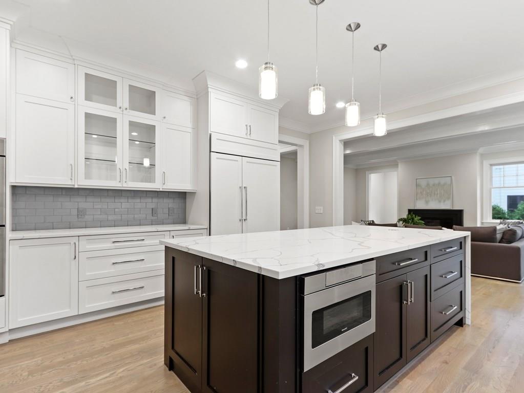 30 Columbine Road Newton, MA 02459 - Photo 11 of 35 a kitchen with a stove a sink and a refrigerator