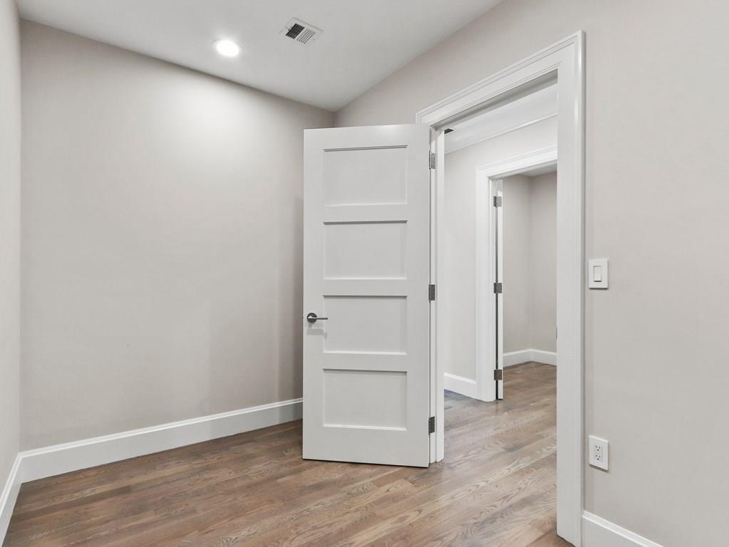 30 Columbine Road Newton, MA 02459 - Photo 25 of 35 an empty room with wooden floor