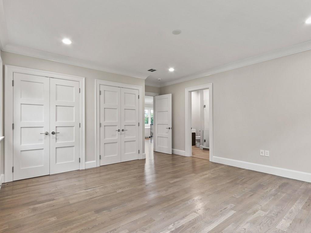 30 Columbine Road Newton, MA 02459 - Photo 27 of 35 a view of an empty room with wooden floor
